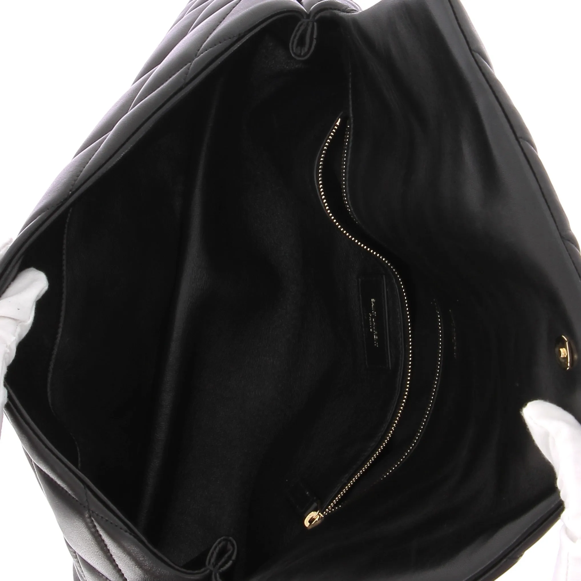 Pochette Sade en cuir matelassé noir